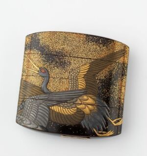  A decorative, rectangular plaque with a curved surface depicting a stylized, dark brown and gold bird in flight against a textured gold and sienna background with flecks creating a starry effect. The bird has a red eye and gold-trimmed feathers.