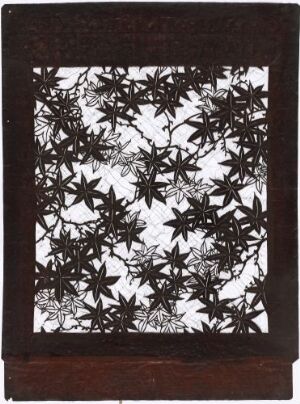  An intricate, star-shaped cut-out pattern in light shades against a dark background, possibly framed or bordered by a deep brown or black material, showcasing detailed geometric designs that create a symmetrical and delicate visual texture. Artist name and title unknown.