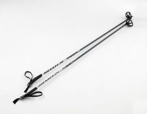  A pair of modern cross-country ski poles by Formel Industridesign AS with metallic silver shafts, black grips, straps, and baskets, set against a white background.