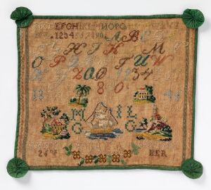  A photograph of a traditional, aged sampler embroidery with a beige background featuring a variety of stitched letters, numbers, and small pictorial designs in muted colors, adorned with green corner tassels.