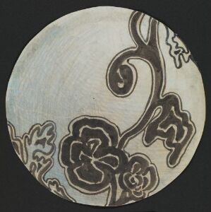  A circular object with a cream background featuring a stylized floral design in dark tones with roses, leaves, and swirling lines, possibly a decorative plate or coaster. Artist and title unknown.