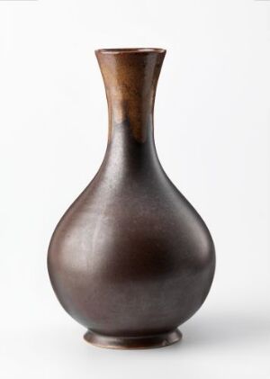  A gracefully curved, brown gradient vase with a narrow opening, a rounded body, and a stable base, set against a white background. Artist name and title unknown.