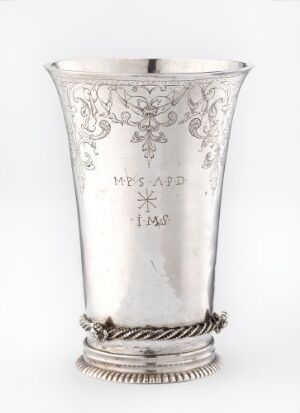  Silver beger tableware piece with an intricately twisted base and engraved decorative patterns, featuring an inscription in the center, against a neutral background. Artist: Unidentified. Title: Beger.