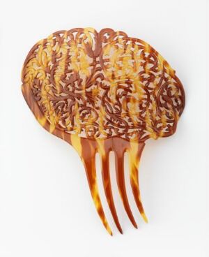  A decorative hair comb designed to mimic the appearance of a human brain, with detailed folds and grooves in shades of amber and brown, featuring a smooth, glossy finish.