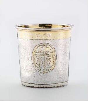  An antique cylindrical silver beaker titled "Beger" by Christen Bruun, featuring engraved lions and a shield motif with a gilded coronet above, evidencing expert craftsmanship in driven and engraved silver with ornate, partially gilded details.