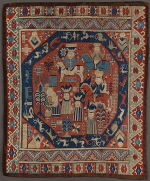  Handwoven tapestry titled "Adoration of the Magi" by artist KID, depicting the three Magi offering gifts to the infant Jesus, with intricate patterned borders in red, blue, and brown hues, framed by a multilayered geometric and floral border.