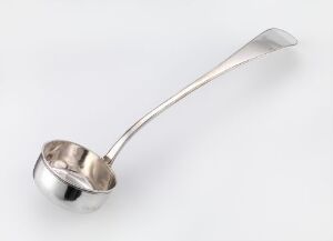  A stainless steel soup ladle with a long handle and a deep, round bowl, lying diagonally on a light, neutral background.