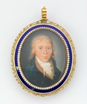  An oval miniature portrait pendant featuring a male figure with shoulder-length powdered hair, dressed in a dark green jacket with a white cravat. The portrait is framed by a blue border accented with golden beads and an ornate gold edge, with a golden loop at the top for wearing as a necklace.