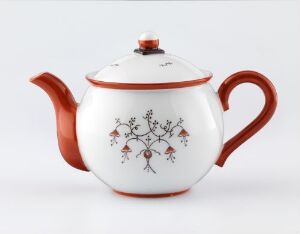  A white porcelain teapot with terracotta-colored handle and spout, designed by Porsgrunds Porselænsfabrik AS, featuring a hand-painted botanical pattern with soft brown, green, and red accents, against a light grey background.