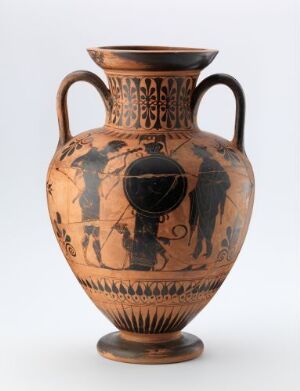  An ancient Greek amphora with black-figure decoration on a beige background, featuring vertical handles and traditional patterns of palmettes and figural scenes.