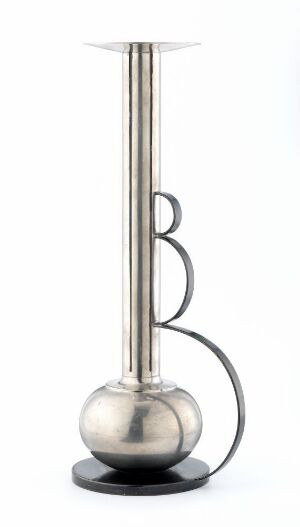  A modern metal candle holder with a matte black base and a polished silver spiral stem leading to a cylindrical shaft, culminating in a flat circular holder, against a white background. Artistname and title are unknown.