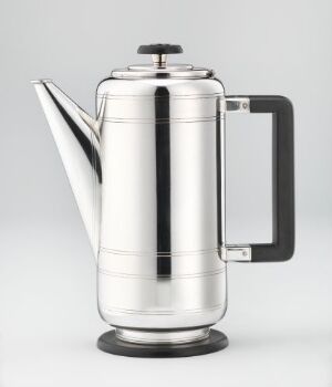  A silver stainless steel coffee pot with a black handle and a black vertical line detail, set against a neutral gray background.