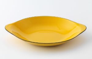  A glossy yellow shallow dish with an asymmetrical, petal-like design set against a neutral light gray background.