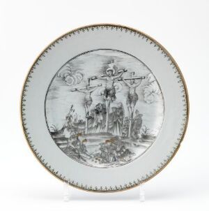  A round ceramic plate with a central grayscale historical or mythological scene surrounded by a decorative yellow or gold rim, set against a light background.