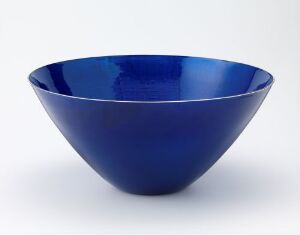  A Grete Prytz Kittelsen designed sterling silver bowl with an inner and outer surface coated in hand-applied, mirror-like blue enamel, exhibiting a simple yet elegant form.