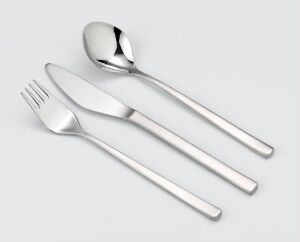  A set of stainless steel tableware by Tias Eckhoff, including a fork, knife, and spoon, all with brushed and polished finishes, on a light gray background.