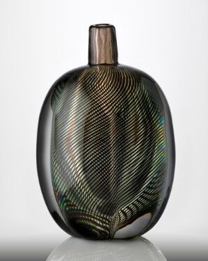  "Slip Graal (no. 1068)" by Orrefors Glasbruk A/B, a blown and cased glass object with a smoky gray body adorned with spiraling lines in green, yellow, and orange, tapering into a bronze-colored neck.