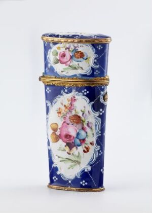  A decorative cylindrical vase with a cobalt blue background and gold scrollwork, featuring oval cartouches with multi-colored floral designs, indicating a piece of fine porcelain or ceramic artistry.