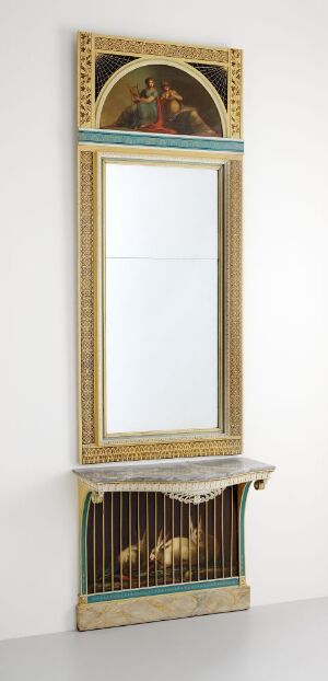  An elaborate console table by Joseph Chr. Lillie, featuring a carved and painted pine structure with a polished marble platform and an attached vertical mirror framed in gold; above is an oil painting on canvas, set against a stark white backdrop.