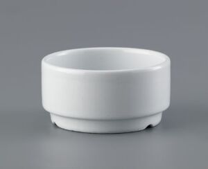  A white, cylindrical porcelain bowl from the "Korulenserviset" collection by Porsgrunds Porselænsfabrik AS, with a glossy finish and minimalistic design, set against a neutral gray background.