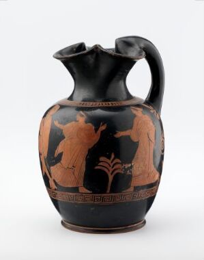  Ancient Greek red-figure vase with a glossy black background and reddish-orange figures engaged in a social or mythological scene. The vase has a rounded belly, a single handle, and exhibits a high level of detail in the depiction of human figures and clothing.