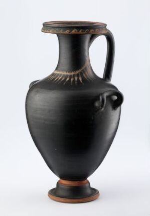  An ancient black ceramic amphora with tan decorative bands on the neck and rim, featuring twin handles for lifting.