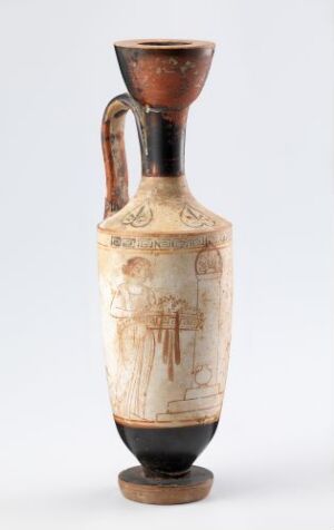  An ancient Greek ceramic lekythos with a black and beige color scheme showcasing traditional figural scenes and patterns, with a single black handle and a flared lip. Artist name and title are unknown.