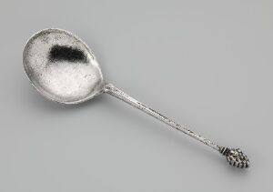  Antique "Sølvskje" silver spoon by artist Berendt Johansen on a gray background, featuring an oval bowl and an ornately engraved handle.