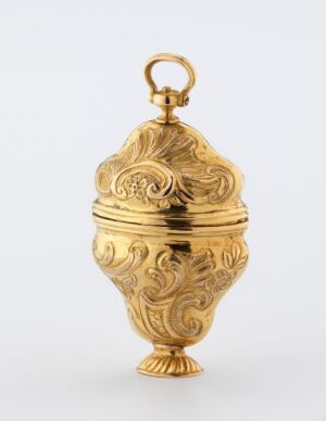  An ornate golden object, possibly a decorative perfume bottle or ornament, featuring intricate acanthus leaf designs, with a seamless golden background.