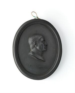  Oval-shaped Wedgwood cameo of Marcus Terentius Varro in monochromatic tones with profile in relief, titled "Marcus Terentius Varro," features an inscription below and has a metal hanging loop.