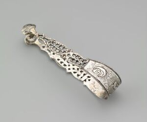  Antique silver sugar tongs ('Sukkerklype') with chased and openwork design, artist unidentified, showcasing detailed scroll and geometric patterns on a gray background.