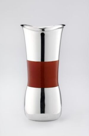  A modern, shiny metallic vase with a matte red band around the center set against a neutral gray background, emphasizing its minimalistic and contemporary design.