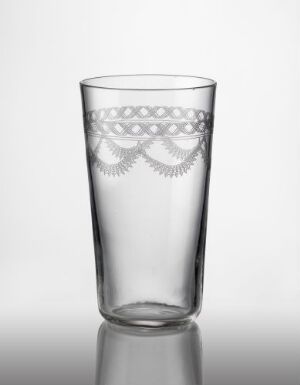  A clear, blown glass with an intricate etched design on the upper third featuring guilloche-style garlands and circular patterns against a light gradient background. Artist unknown; title unknown.