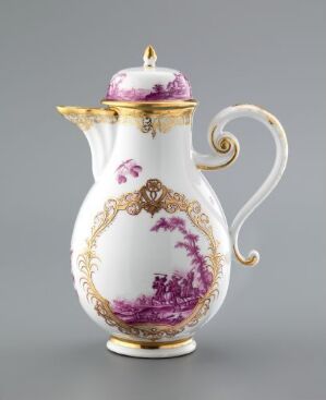  An ornate porcelain chocolate pot with a white base and purple landscape decorations, highlighted with gold accents and featuring a curvaceous gold-trimmed handle and spout, set against a light grey background.