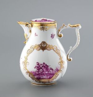  An ornate white porcelain jug with gold detailing and a central purple vignette featuring classical figures. The jug has a decorative gold handle and a pink finial on the lid.