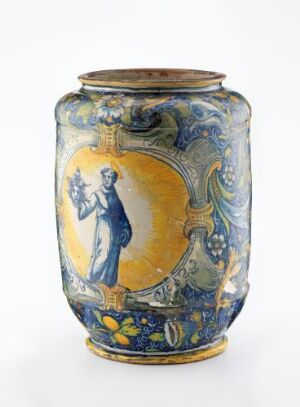  An antique vase with a rich cobalt blue base and golden-yellow painted panels featuring a classical figure of a woman and intricate acanthus leaf and floral designs.