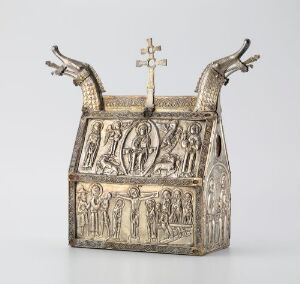  "Kopi av Hedalskrinet" by J. Tostrup, an ecclesiastical copper casket with detailed biblical relief scenes, culminating in a cross flanked by stylized animal figures.