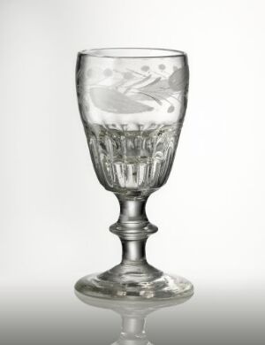  A clear glass goblet with intricate patterns engraved on its bowl stands against a light, gradient background, reflecting subtle light distortions. Artist name and title are unknown.