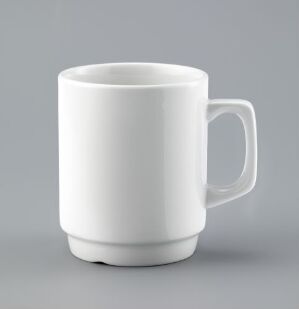  A white vitroporcelain mug with a sleek minimalist design by Ragnar Grimsrud, featuring a smooth glaze finish and a gracefully curved handle, against a light grey background.