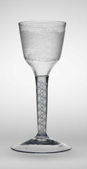  Black and white photograph of a finely crafted glass goblet by Heinrich Gottlieb Köhler with engraved patterns on the bowl and bubble design on the stem, displayed against a plain background.