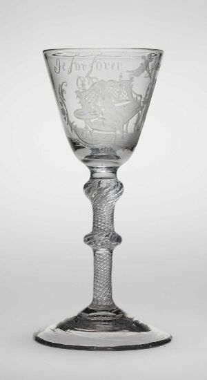  A clear glass goblet, elegantly crafted by Heinrich Gottlieb Köhler named "Desert med Perler og Slanger", featuring intricate engravings on the bowl and a detailed stemmed design with a pearl-like pattern, showcased against a plain background to accentuate its details.