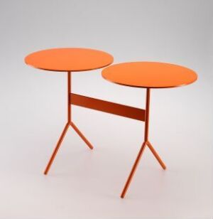  A colorful, orange lacquered steel sidetable with a dual-level round top, designed by Norway Says, set against a neutral gray background.