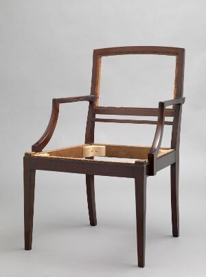  An elegant wooden armchair with a dark brown finish against a light grey background, featuring a missing seat cushion, straight legs, and a curved backrest.