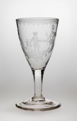  A clear engraved glass goblet with a tulip-shaped bowl, a slender stem, and a circular foot, displayed against a light-gray background.