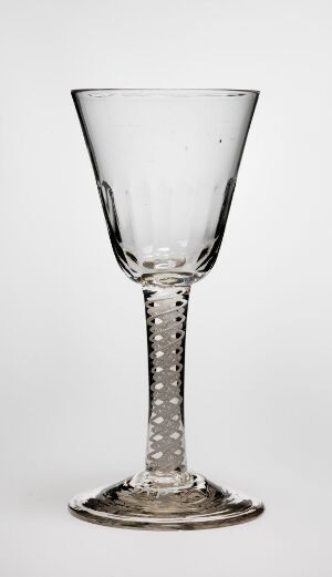  An elegant transparent glass goblet with a conical bowl, a stem with vertical spherical bubbles, and a simple, stable foot, set against a light gray background.