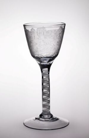  An engraved clear glass goblet designed by Villas Hansen Vinter with a twisted stem pattern, displayed against a softly graduated background.