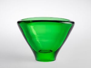  A translucent green, cone-shaped glass vase with a lighter top edge and a darker, rich emerald body on a light gray background.