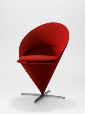  A Verner Panton-designed Kræmmerhusstol (K 1) chair on a neutral background, featuring a vibrant scarlet wool upholstery over a conical shape with an X-shaped metallic base.