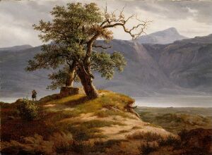  An oil painting on canvas by Thomas Fearnley depicting a robust tree with mixtures of live and bare branches, situated on a grassy hill with hues of green, yellow, and brown. A small figure sits to the left of the tree, amidst the serene scene that includes distant blue and purple mountains under a light blue sky with faint clouds.