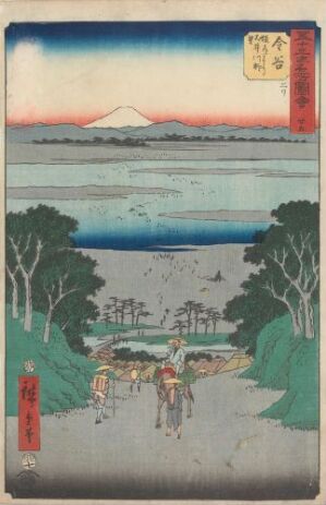  Utagawa Hiroshige's "Kanaya: View of the Ôi River from the Uphill Road" is a traditional Japanese woodblock print on paper featuring the tranquil landscape with Mount Fuji in the background, travelers walking along a road bordered by green trees, and the broad Ôi River stretching horizontally across the print, all depicted in a delicate palette of blues, greens, pinks, and muted earth tones.